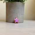 Pink holographic charm
