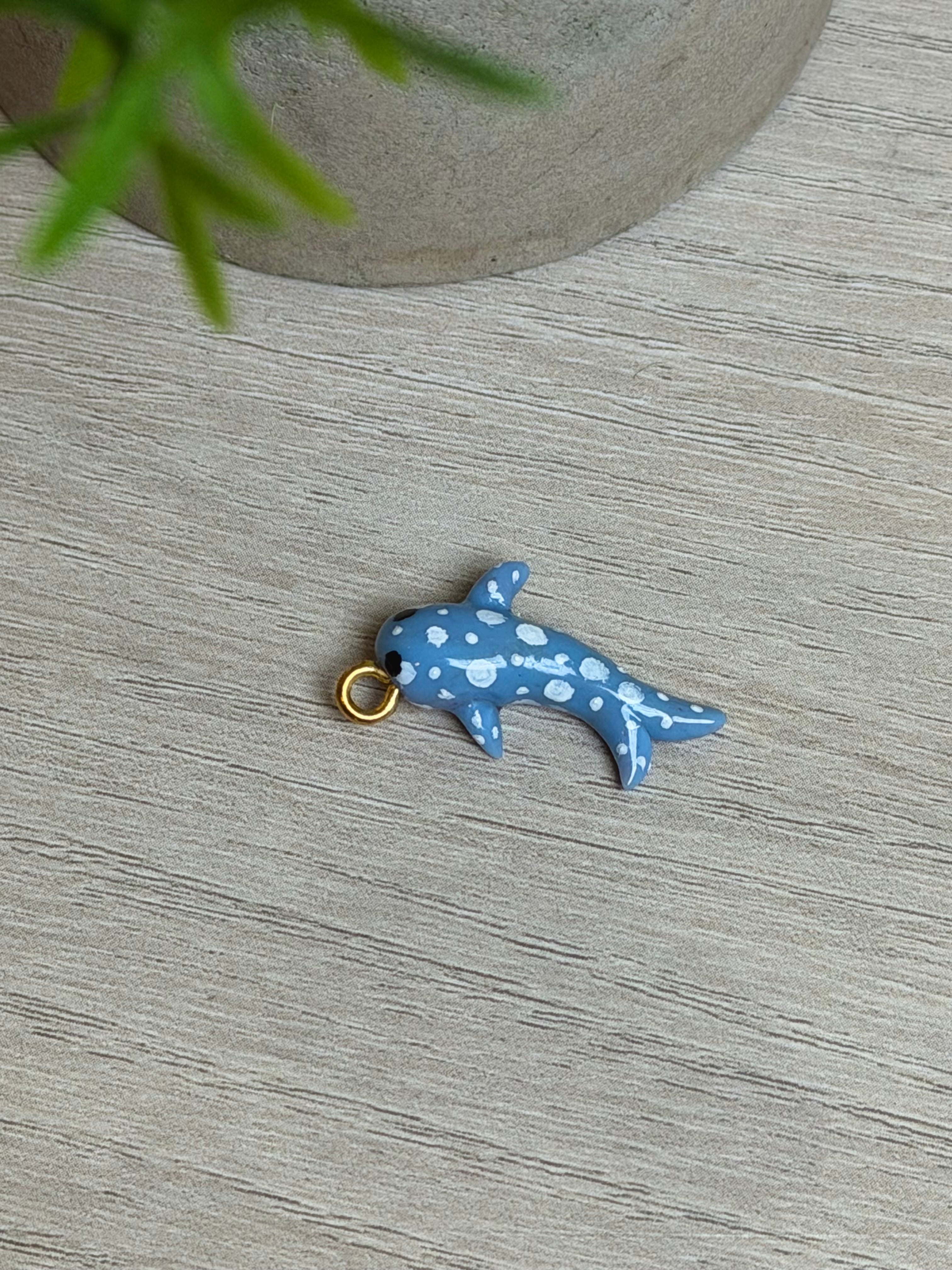 Spotted fish charm