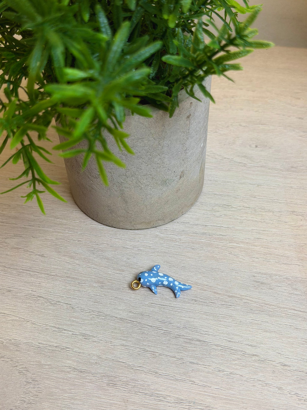 Spotted fish charm
